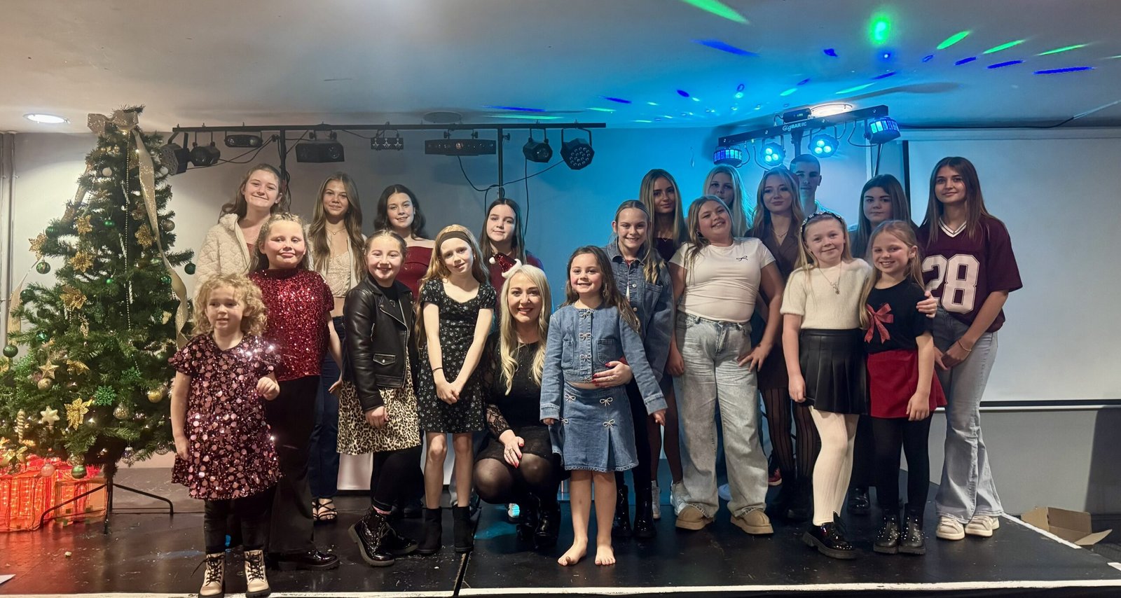 Lauren Waterworth with her vocal coaching students at a showcase