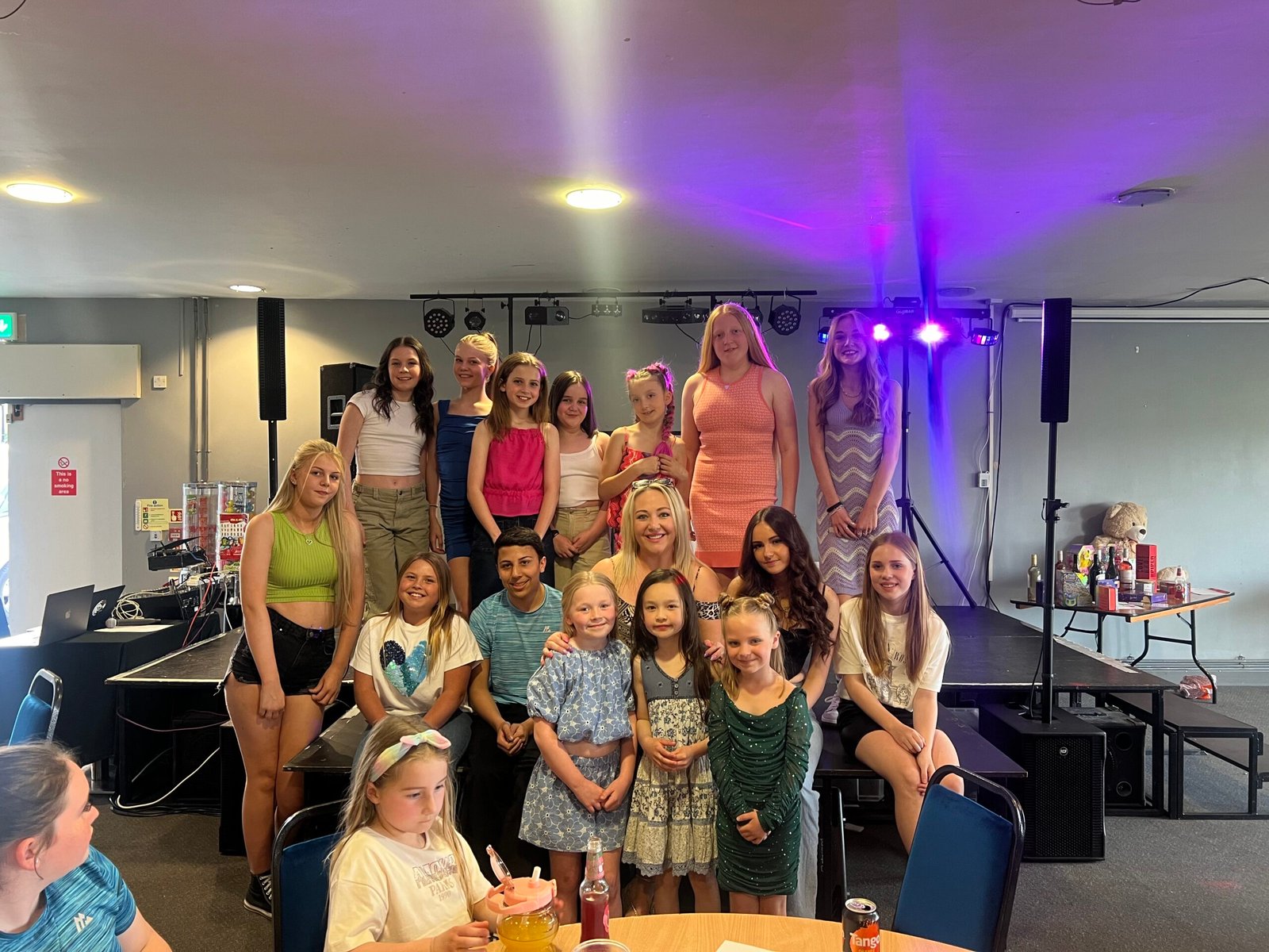 Lauren Waterworth with children from her performing arts community
